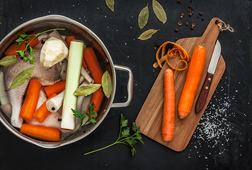 Alice Engelbrink's ingredients to make your own homemade chicken stock in a big pot